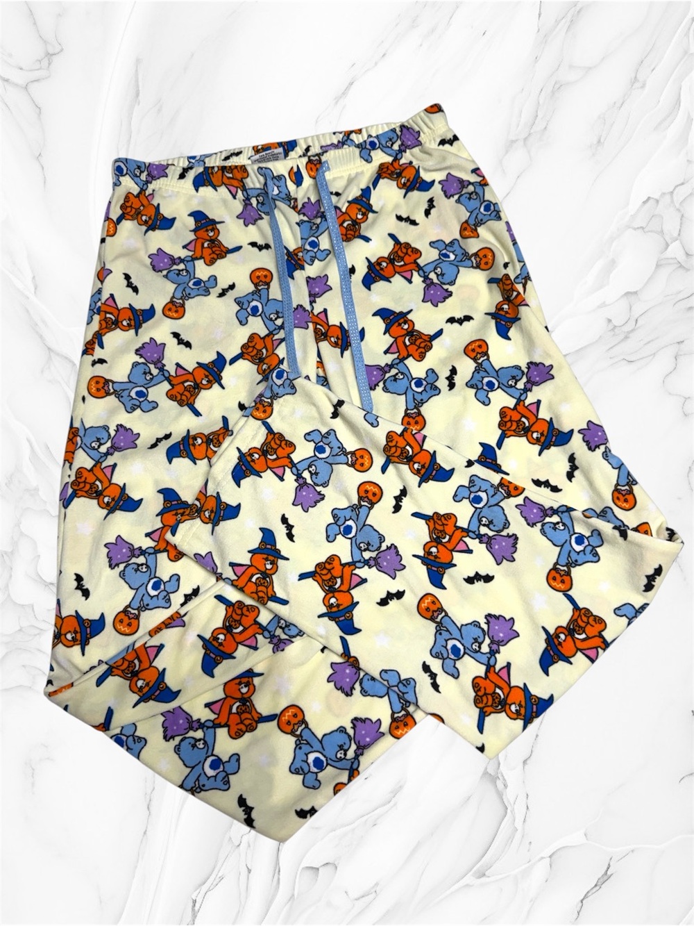 Care Bears Cream Halloween Jogger Pants with Orange & Blue Print medium NWT